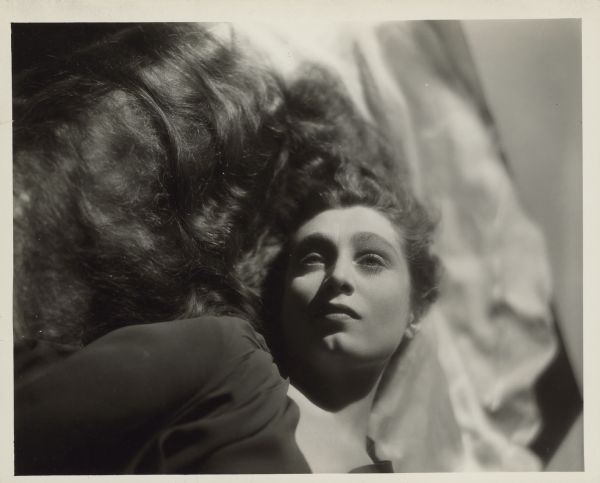 Aline MacMahon Lying on Bed | Photograph | Wisconsin Historical Society