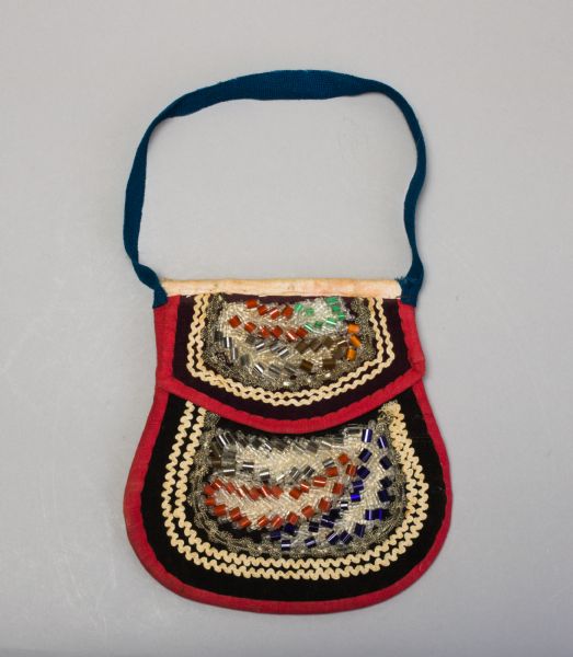 A small beaded bag created by a member of the Oneida tribe. 