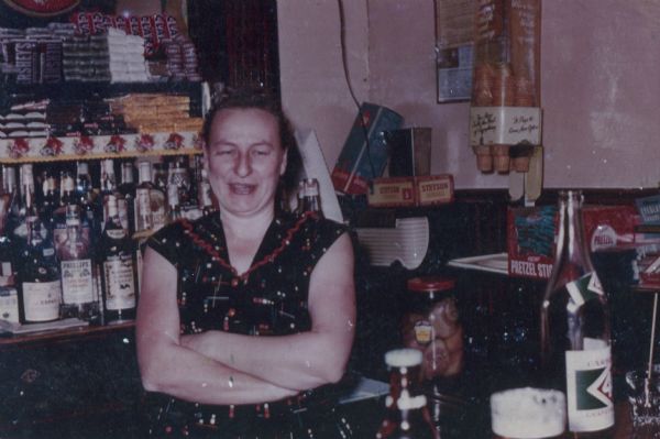Lorraine Wittnebel standing behind the bar at Wittnebel's Tavern.
