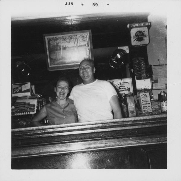 Proprietors Roy and Lorraine Wittnebel standing behind the bar inside Wittnebel's Tavern. 