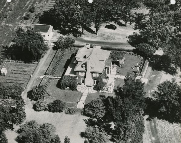 An aerial view of the Zerk residence showing the chimney on the left side of the house. 