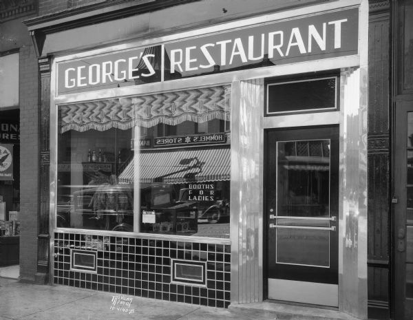 George's restaurant, 307 State Street. "Booths for Ladies." Reflection in window is of Hommel's Star Food Stores across the street.