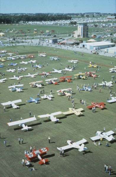 Aerial view of small aircraft parked at the Experimental Aircraft Association (EAA) AirVenture fly-in held at the Wittman Regional Airport.