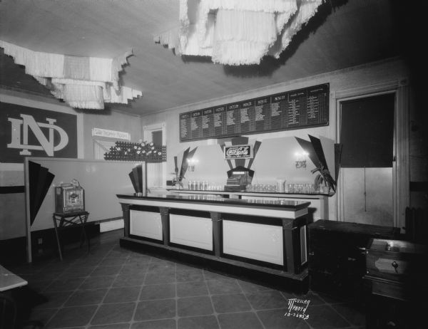 Mark Martin's Restaurant, "The Trophy Room" with slot machine and sports score board on the wall, 2nd floor, 107 State Street.