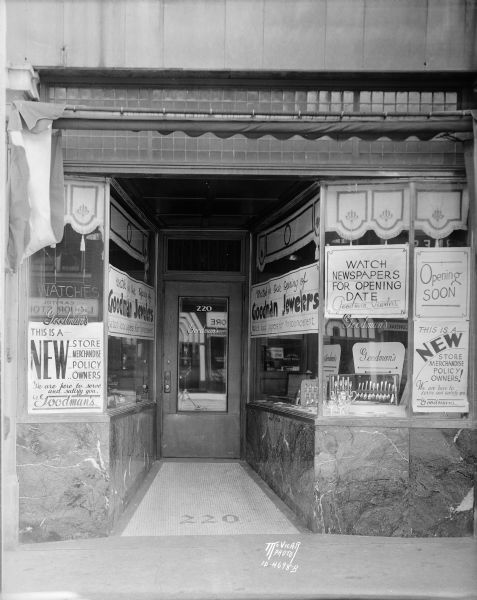 Goodman's Jewelers, 220 State Street. Signs read: "Watch for opening of Goodman's Jewelers" and "Watch newspapers for opening date."