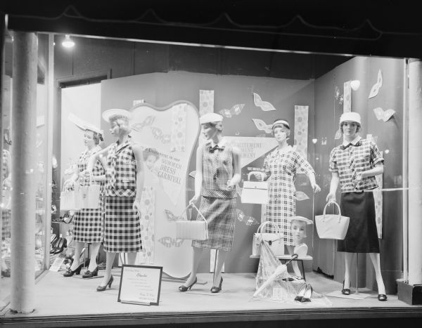 Hill's Department Store, 202 State Street, display window featuring summer dresses with black and white checks. Includes five mannequins and a sign stating "Black and White Checks".