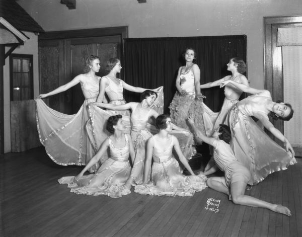 Members of the Audrey Medaris' dancers from the Wheeler School of Dance, featured at the Purim Frolics charity ball, are posing in costume. They are Betty Nelson, Betty Herried, Sue Lenzer, Joan Svendsen, Betty Jane MacKinlay, Helen Didrickson, Jean Gorman, Shirlie Dodge and Marjorie Muehl.