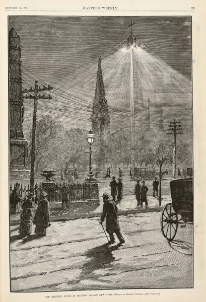 A drawing showing Madison Square at night, lit by electric lighting at the top of a mast. Men and women are strolling on the sidewalks and walking on the street. Caption reads: "The Electric Light in Madison Square, New York."