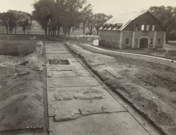 Completed excavations at Fort Crawford showing the north row of buildings. Caption reads: "N. Row Bldgs. Completed excavations, Ft. Crawford."